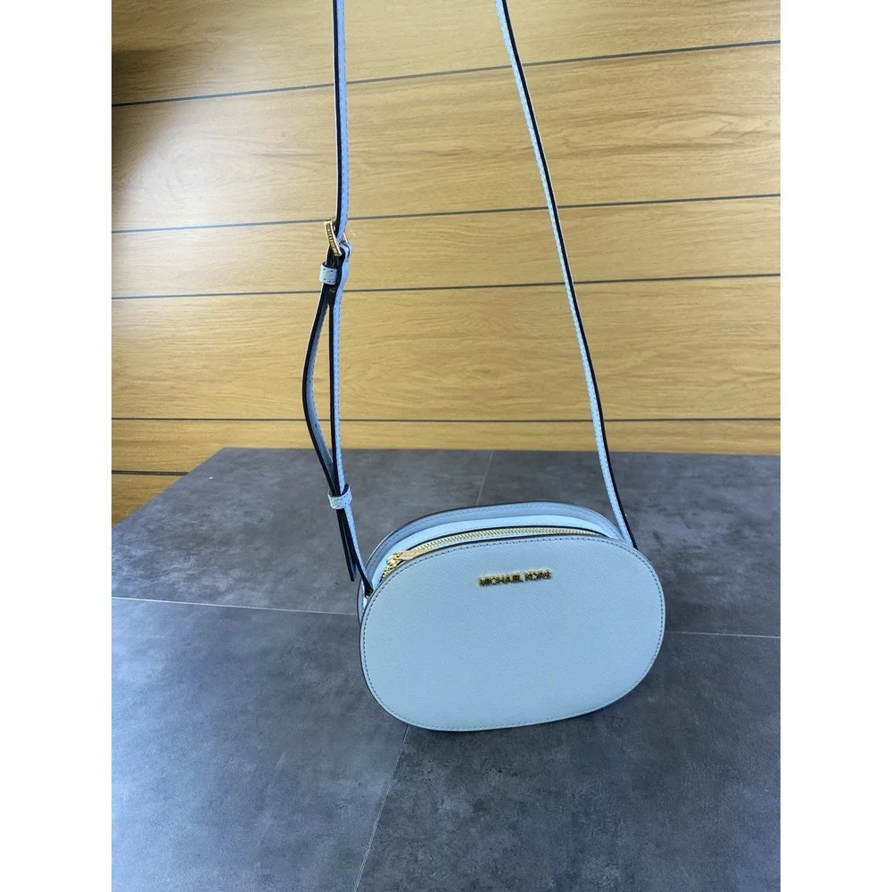 Michael Kors  baby blue Jet Set Oval crossbody bag